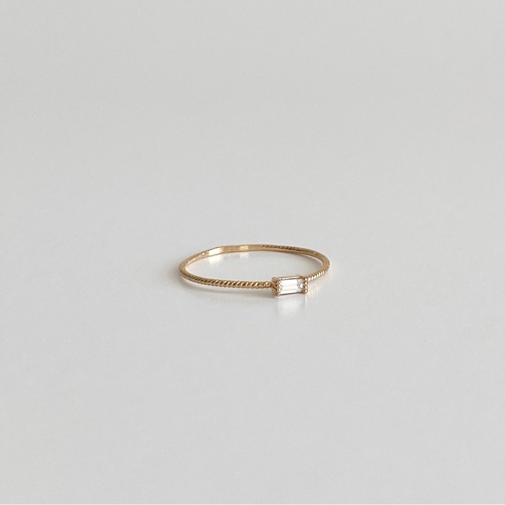 Gold toned mini baguette ring